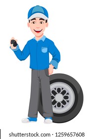 Professional auto mechanic in uniform. Smiling cartoon character stands near wheel and holds car keys. Expert service worker. Vector illustration