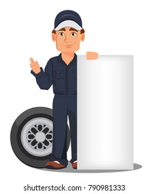 Professional auto mechanic in uniform. Smiling cartoon character standing near blank placard and car wheel. Expert service worker. Vector illustration