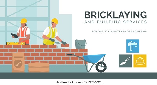 Professional builders laying bricks and checking brickwork