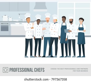 Professional chefs standing together in the restaurant's kitchen