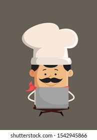 Professional Cute Chef - Sitting and Working on Laptop