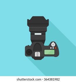 Professional dslr photo camera top view vector illustration in flat style with long shadow on blue background