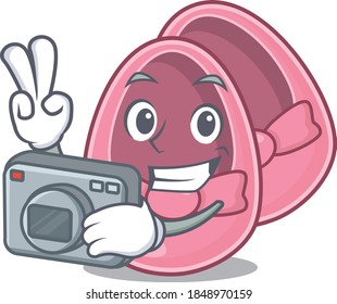 a professional photographer baby girl shoes cartoon picture working with camera