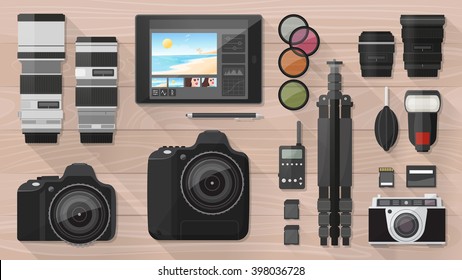 Professional photographer equipment on a desk, shooting and photo editing concept, flat lay