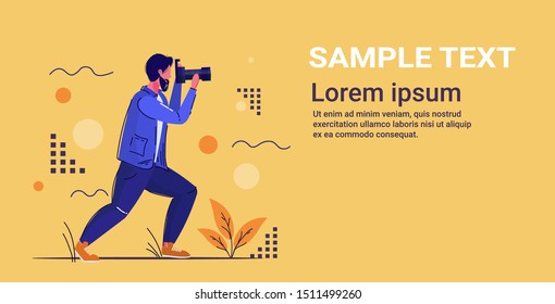 professional photographer taking picture photo man shooting with digital dslr camera full length flat horizontal copy space