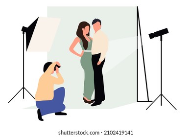 Professional photographers taking pictures. Men and woman models posing in professional photography studio with cameras and light tripods.