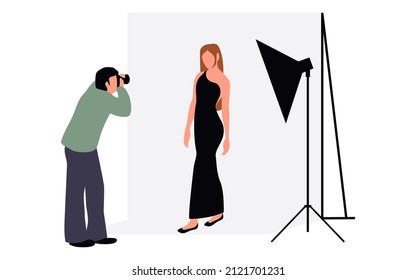 Professional photographers taking pictures. Men and woman models posing in professional photography studio with cameras and light tripods.