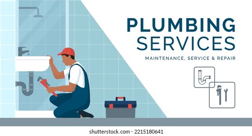 Professional plumbers service: a plumber is unclogging a sink and checking drain