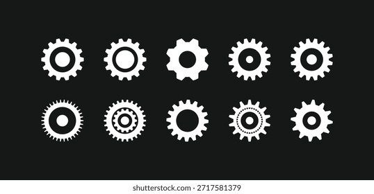 Professional set of white gear wheels on black background. Clean vector icons for mechanical engineering, industry settings, and system integration
