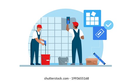Professional tilers installing tiles on a wall using professional tools, home renovation concept