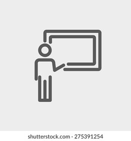 Professor in front of a blackboard icon thin line for web and mobile, modern minimalistic flat design. Vector dark grey icon on light grey background.