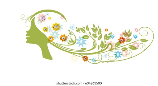 Profile of a beautiful girl with flowers in her hair. Summer hairstyle.