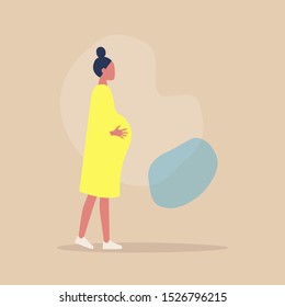 A profile full view of young caucasian pregnant woman touching her belly