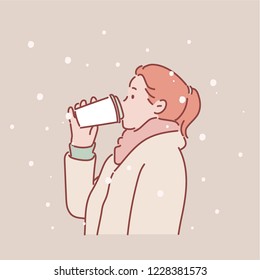 The profile of a girl drinking coffee on a snowy day. hand drawn style vector design illustrations.