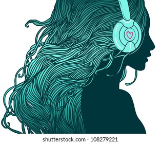 Profile of pretty girl with long hair in headphones