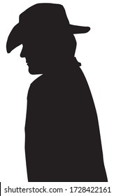 A profile view of a cowboy wearing a hat in silhouette and walking down the street