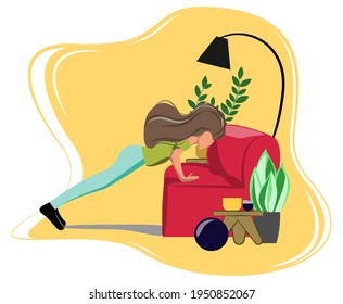 Profile view of a young woman performing push up leaning on a sofa in her living room.