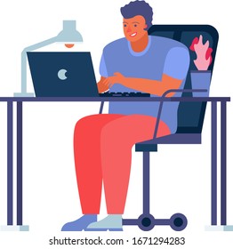 The programmer is sitting at the laptop and working. Office worker. Young programmer. Modern working rhythm.