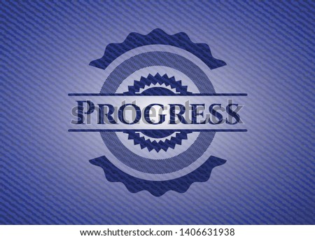 Progress emblem with denim high quality background. Vector Illustration. Detailed.