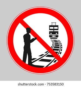 Prohibition sign: do not cross railway tracks, danger for life. Prohibition sign: to cross railroad tracks in the vicinity of a train is PROHIBITED!