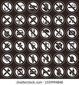 Prohibition signs on dark background