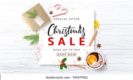 Promo Banner for Christmas Sale. Festive Composition with Paper Gift Box and Xmas Symbols for Happy New Year on Wooden Texture. Beautiful Greeting Card. Vector Illustration with Discount Offer.