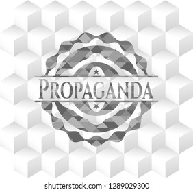 Propaganda grey badge with geometric cube white background