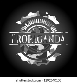 Propaganda on grey camo texture