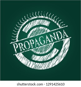 Propaganda written on a blackboard