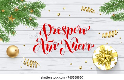 Prospero Ano Nuevo Spanish Happy New Year golden decoration and calligraphy font on white wooden background for greeting card. Vector Christmas gold shiny star on Xmas tree for winter holiday