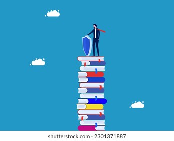 Protect knowledge. Businessman with protective shield standing on high pile of books