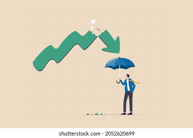 Protect from stock market crash, insurance to protect from risk or uncertainty, investment margin of safety concept, businessman investor holding strong umbrella ready for downturn arrow graph.