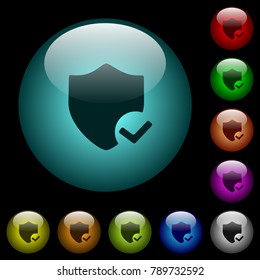 Protection ok icons in color illuminated spherical glass buttons on black background. Can be used to black or dark templates