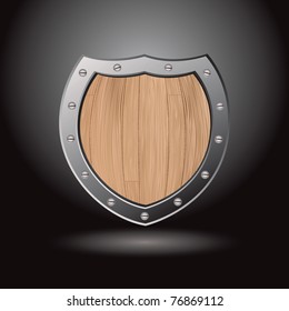 Protective wood shield icon with black background and spot light