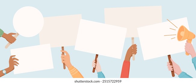 Protest signs are held high by a diverse hands. People raise placards and banners with a strong message. Human hand lift blank boards, showing unity, solidarity and support in the demonstration.