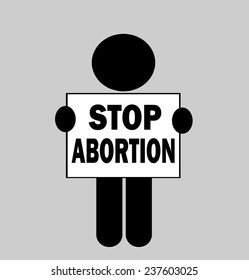 protester holding stop abortion sign