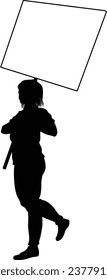 Protestor or demonstrator at a demonstration march, picket line or strike protest rally in silhouette. Holding up a banner or picket sign board placard.