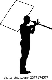 Protestor or demonstrator at a demonstration march, picket line or strike protest rally in silhouette. Holding up a banner or picket sign board placard.