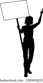 Protestor or demonstrator at a demonstration march, picket line or strike protest rally in silhouette. Holding up a banner or picket sign board placard.