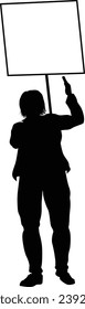 Protestor or demonstrator at a demonstration march, picket line or strike protest rally in silhouette. Holding up a banner or picket sign board placard.