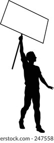 Protestor or demonstrator at a demonstration march, picket line or strike protest rally in silhouette. Holding up a banner or picket sign board placard.