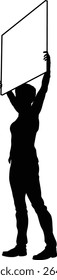 Protestor or demonstrator at a demonstration march, picket line or strike protest rally in silhouette. Holding up a banner or picket sign board placard.