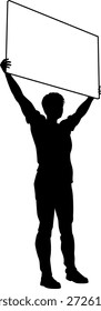 Protestor or demonstrator at a demonstration march, picket line or strike protest rally in silhouette. Holding up a banner or picket sign board placard.
