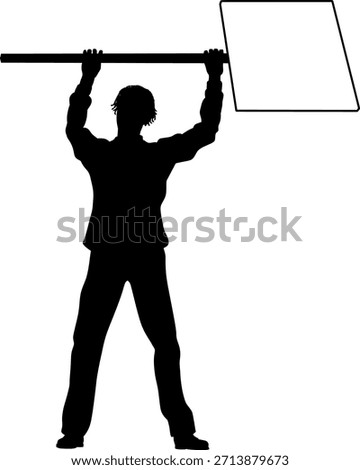 Protestor or demonstrator at a demonstration march, picket line or strike protest rally in silhouette. Holding up a banner or picket sign board placard.