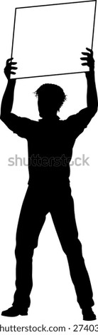Protestor or demonstrator at a demonstration march, picket line or strike protest rally in silhouette. Holding up a banner or picket sign board placard.