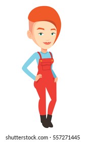 Proud caucasian female farmer in overalls standing with hand in her pocket. Illustration of full lenght of young satisfied female farmer. Vector flat design illustration isolated on white background.