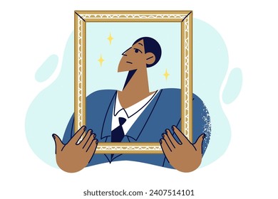 Proud man in business clothes holding golden portrait frame, for concept of narcissism and encouraging alter ego. Proud guy poses for honor board with pictures of company best employees