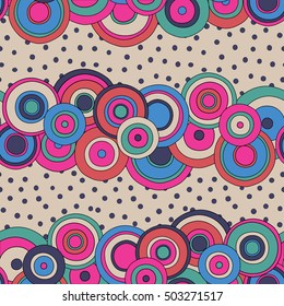 psychedelic circles seamless pattern, geometric 
doodle texture in bright red, pink, magenta, violet, blue, green colors,  vivid backdrop, 1960 fashion textile print, vector eps10 editable
