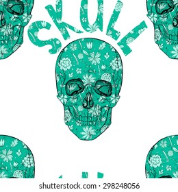 Psychedelic seamless blue skull pattern with blue flowers.