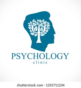 Psychology concept vector logo or icon created with Greek Psi symbol as a tree with leaves inside of man face profile, mental health concept, psychoanalysis analysis and psychotherapy.